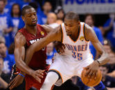 Kevin Durant of the Oklahoma City Thunder posts up Dwyane Wade of the Miami Heat in the fourth quarter in Game One of the 2012 NBA Finals at Chesapeake Energy Arena on June 12, 2012 in Oklahoma City, Oklahoma. (Photo by Ronald Martinez/Getty Images)