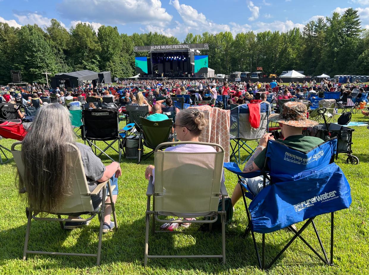 Alive Music Festival drew several thousand people on Thursday at Atwood Lake Park. The event continues through Saturday.