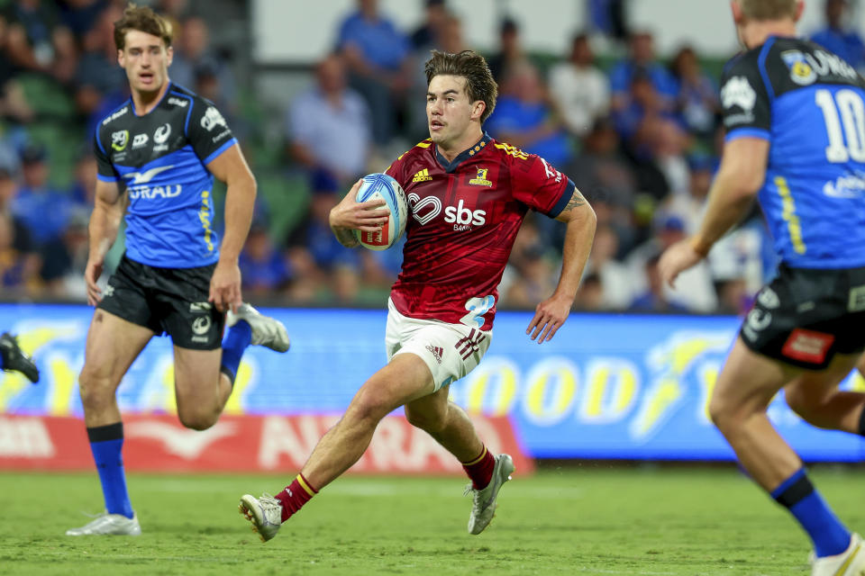 Connor Garden-Bachop of the Highlanders runs at the defense during the Super Rugby Pacific against he Western Force in Perth, Australia, April 22, 2023.  / Credit: James Worsfold / AP