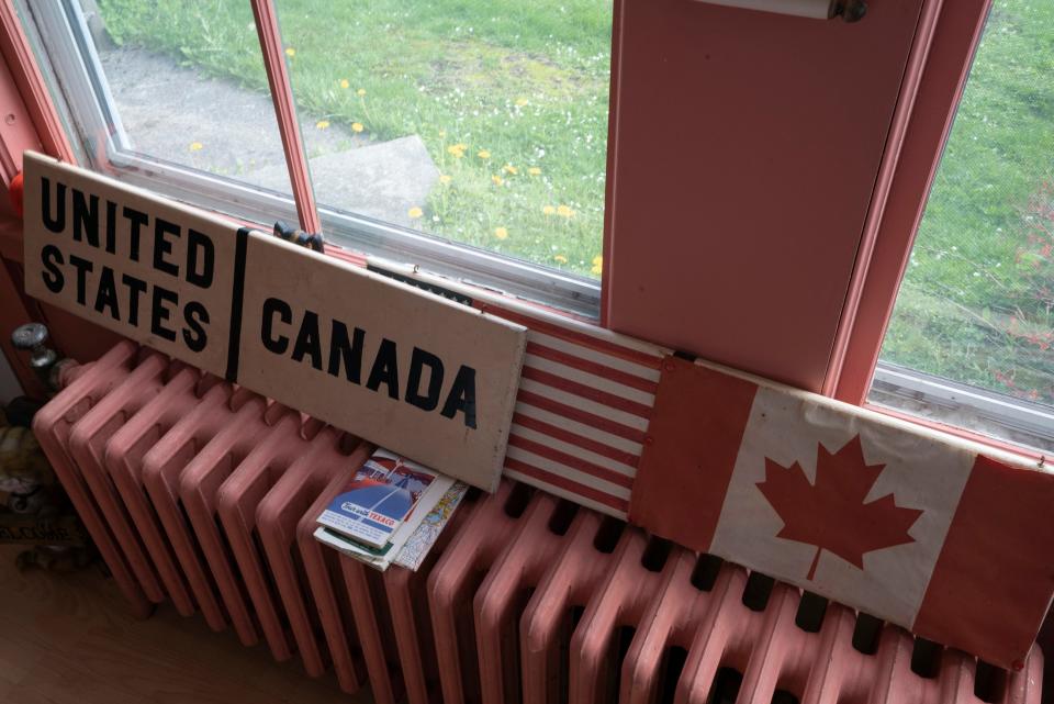 Two United States-Canada border signs that had been on display at the Nelson Country Store in Norton, Vt.