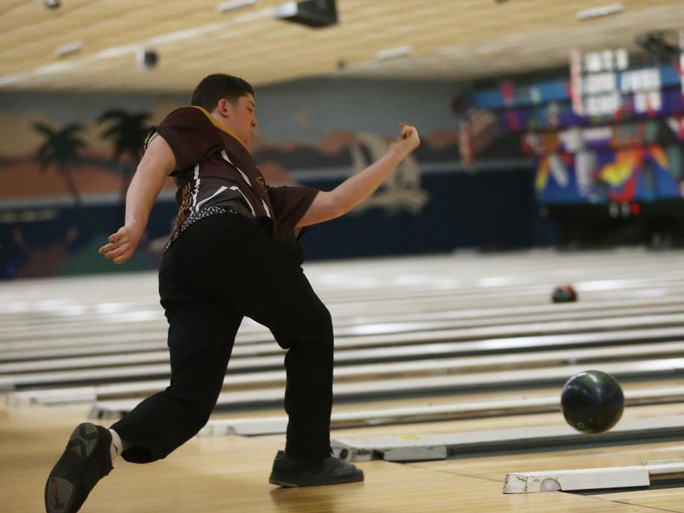 Arlington's Braden Cassidy bowls in the Section 1 boys bowling championship in Fishkill on February 14, 2024. Cassidy had a final combined score of 1308.