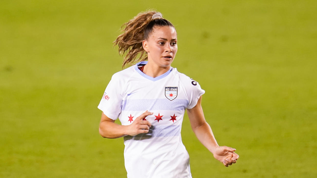 Chicago Red Stars defender Sarah Gorden (11) runs upfield during an NWSL Challenge Cup soccer match, Friday, April 9, 2021, in Houston. (AP Photo/Matt Patterson)