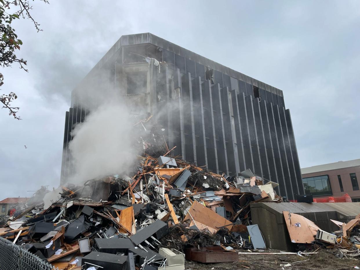 Demolition has begun at the University of Detroit Mercy's Fisher Administrative Center building Sept. 29, 2023. The building, located at the corner of Livernois Avenue and Florence Street, has been standing at the university's McNichols Campus since 1966.