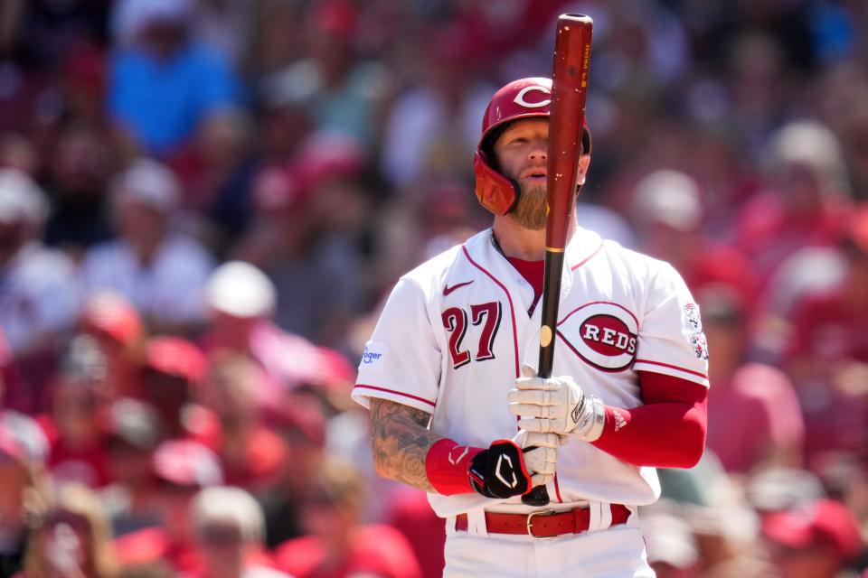 Cincinnati Reds outfielder Jake Fraley plans to play through a foot injury since the Reds are a special team with a shot at the playoffs.