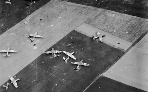 Parachutes and Airspeed Horsa gliders on 6th Airborne Division's Landing Zone 'N' near Ranville, on the morning of, 6 June 1944 - Credit: &nbsp;IWM/Getty Images