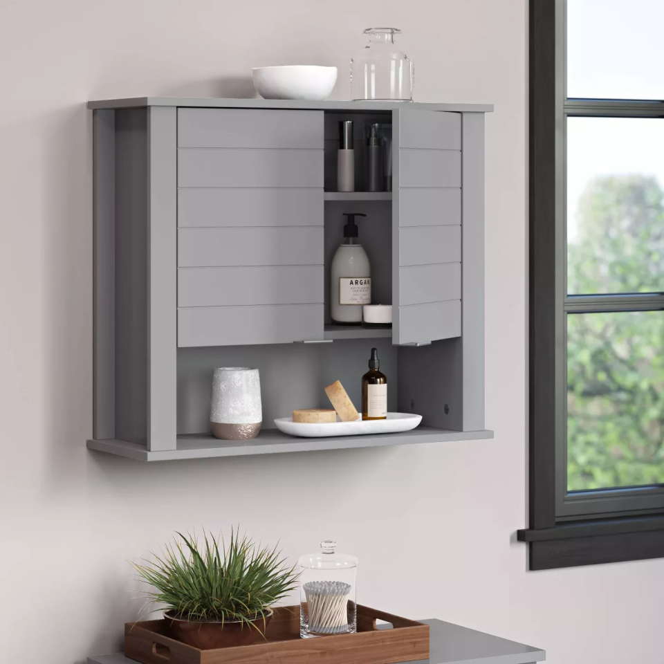 <h2>Madison Collection Two Door Wall Cabinet</h2><br><strong>When your bathroom can't contain your beauty routine</strong>: This wall-mountable bathroom cabinet is the answer to containing your overload of personal products — hair to skincare, beauty essentials, and more.<br><br><em>Shop <a href="https://goto.target.com/Nnkvq" rel="nofollow noopener" target="_blank" data-ylk="slk:Target" class="link "><strong>Target</strong></a></em><br><br><strong>Madison Collection</strong> Two Door Wall Cabinet, $, available at <a href="https://go.skimresources.com/?id=30283X879131&url=https%3A%2F%2Fgoto.target.com%2FNnkvq" rel="nofollow noopener" target="_blank" data-ylk="slk:Target" class="link ">Target</a>