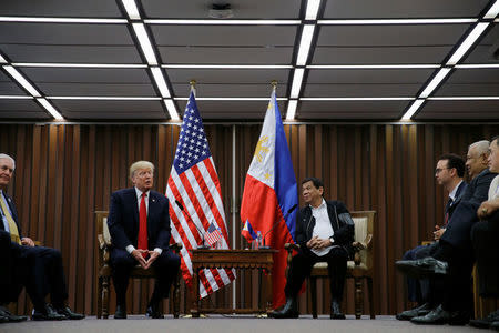 U.S. President Donald Trump holds a bilateral meeting with President of the Philippines Rodrigo Duterte alongside the ASEAN Summit in Manila, Philippines November 13, 2017. REUTERS/Jonathan Ernst