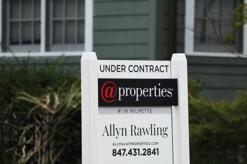 An "Under Contract" sign is displayed at a home in Wilmette, Ill., Thursday, March 28, 2024. On Thursday, April 25, 2024, Freddie Mac reports on this week’s average U.S. mortgage rates. (AP Photo/Nam Y. Huh)