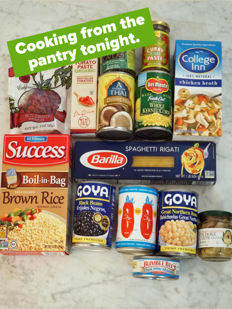 A handful of pantry ingredients and non-perishables on a counter.