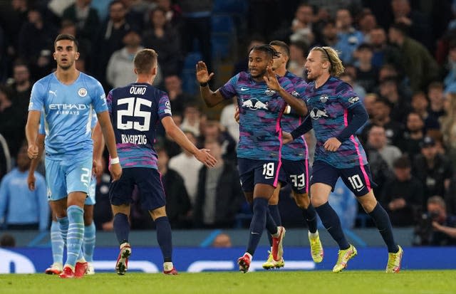 Christopher Nkunku celebrates scoring against Manchester City