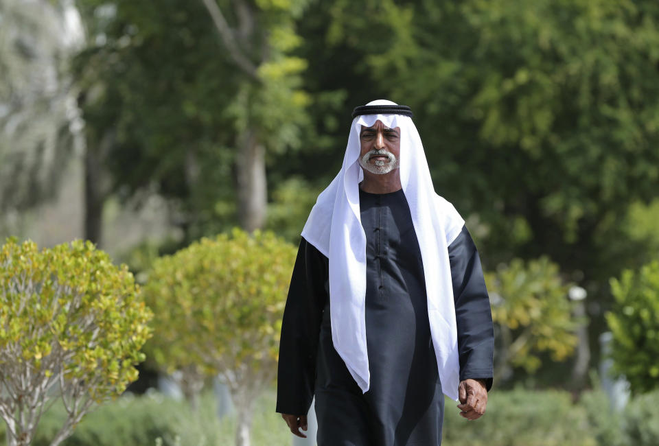 Sheikh Nahyan bin Mubarak Al Nahyan, the UAE Minister of Tolerance walks in his garden before an interview with The Associated Press, in Abu Dhabi, United Arab Emirates, Thursday, Jan. 24, 2019. As the UAE prepares to host Pope Francis Feb. 3-5, the country’s minister of tolerance says the first-ever papal visit to the Arabian Peninsula will contribute to building bridges in a region riven by political and sectarian divisions. (AP Photo/Kamran Jebreili)