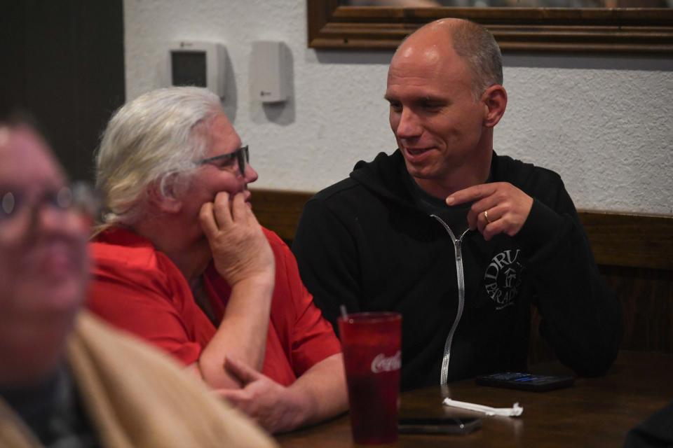 District 2 School Board candidate Glen Gaugh speaks to his mother and District 3 School Board incumbent Debbie Gaugh during the Constitutional Republicans March 5 Election watch party inside Mulligan's in Jackson, Tenn. on Tuesday, March 5, 2024.