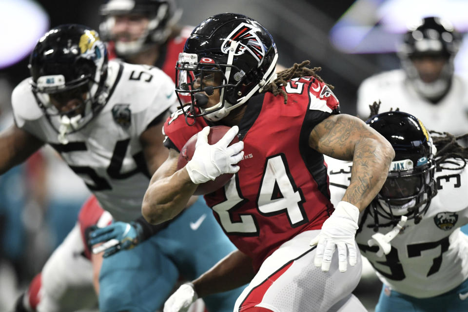 Atlanta Falcons running back Devonta Freeman (24) runs against the Jacksonville Jaguars during the second half of an NFL football game, Sunday, Dec. 22, 2019, in Atlanta. (AP Photo/Danny Karnik)