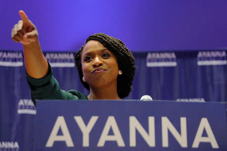 Democratic candidate for U.S. House of Representatives Ayanna Pressley points to her supporters after winning the Democratic primary in Boston, Massachusetts, U.S., September 4, 2018. REUTERS/Brian Snyder