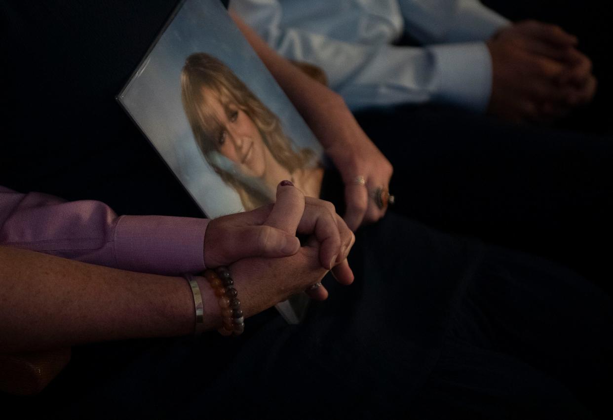 Parents of Jillian Ludwig, Matt Ludwig and Jessica Ludwig, hold hands as they listen during the debate over “Jillian’s Law” at Tennessee Capitol in Nashville , Tenn., Monday, April 15, 2024.