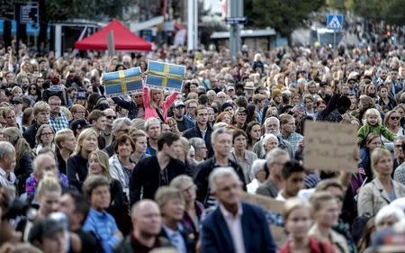 People attend a 'Refugees Welcome' demonstration at the Gotaplatsen square in Gothenburg, Sweden, September 9, 2015. REUTERS/Adam Ihse /TT News Agency
