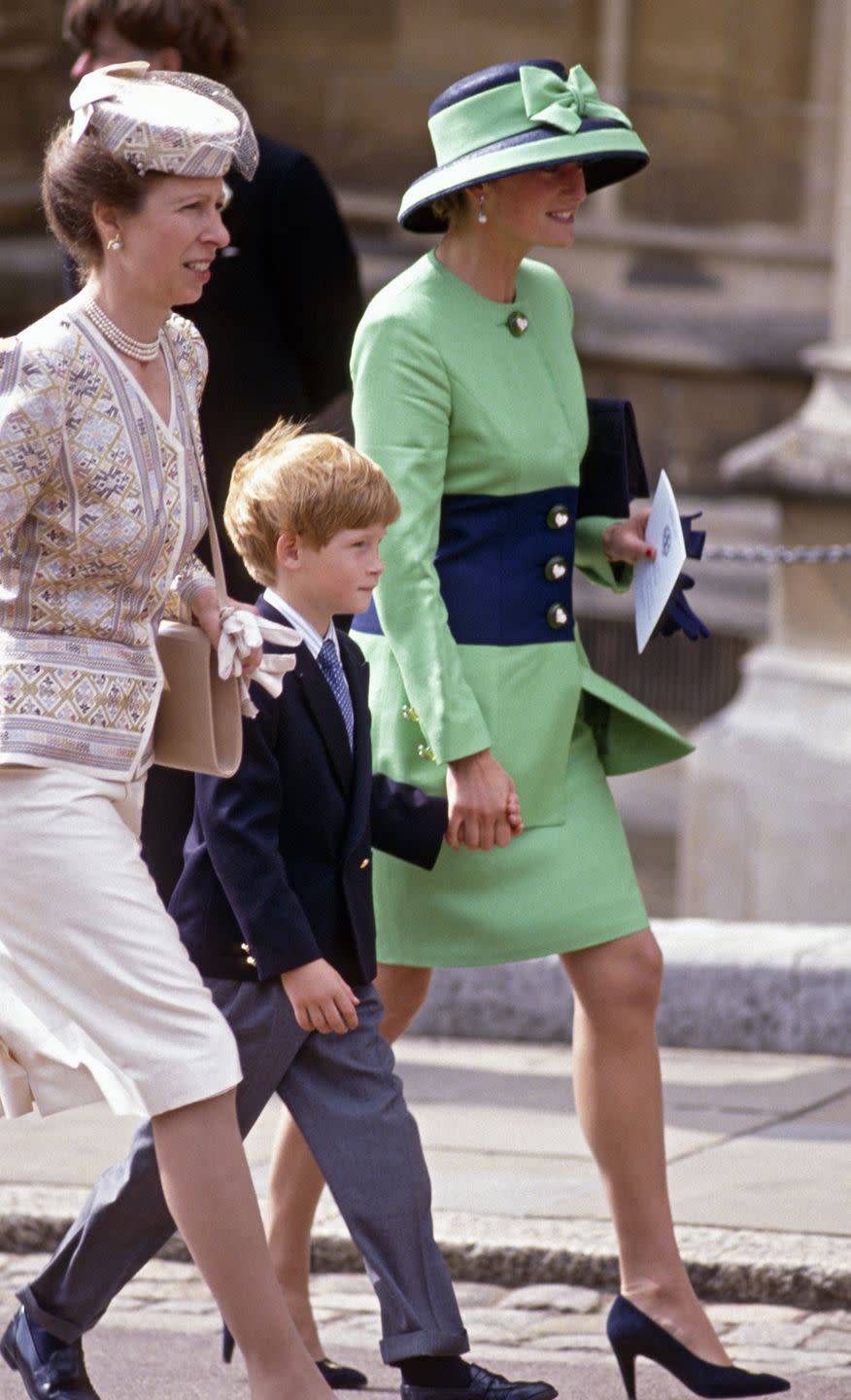 <p>Princess Anne, Prince Harry, and Princess Diana returning from St. George's Chapel in Windsor after the marriage of Lady Helen Windsor and Timothy Taylor. </p>