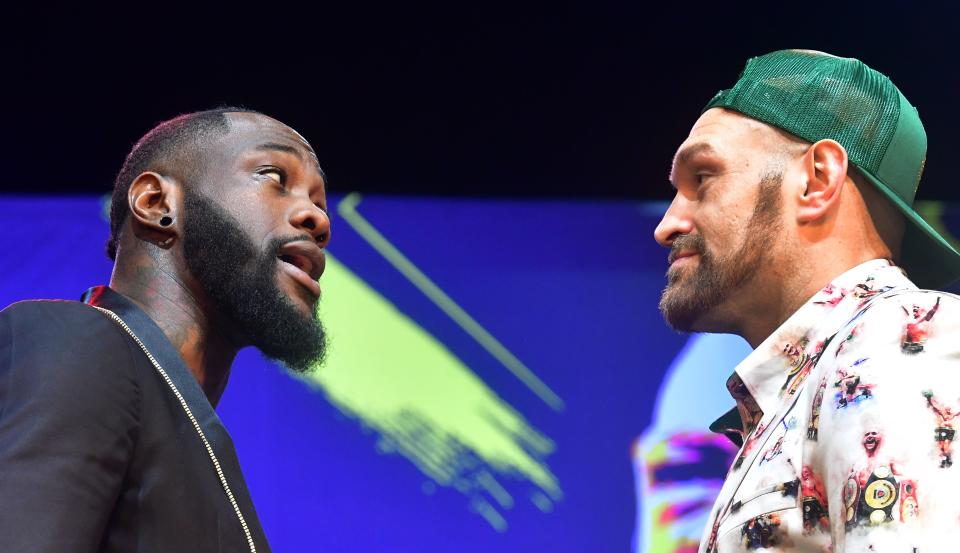 Boxers Deontay Wilder (L) and Tyson Fury (R) face-off during a press conference in Los Angeles, California on January 13, 2020 ahead of their re-match fight in Las Vegas on February 22. (Photo by Frederic J. BROWN / AFP) (Photo by FREDERIC J. BROWN/AFP via Getty Images)