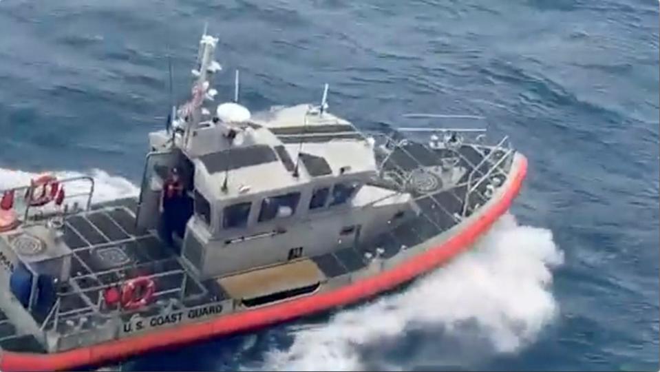 2 A U.S. Coast Guard vessel travels to the Regal Princess cruise ship to pick up COVID 19 samples from the crew, off the coast of Miami, Florida