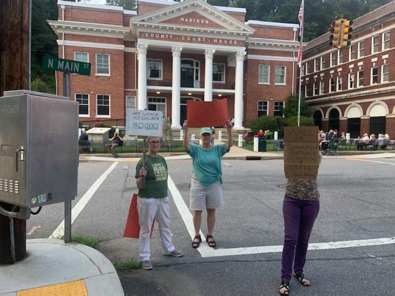 A number of residents gathered in opposition to an anti-abortion rally held at the Marshall courthouse July 13.