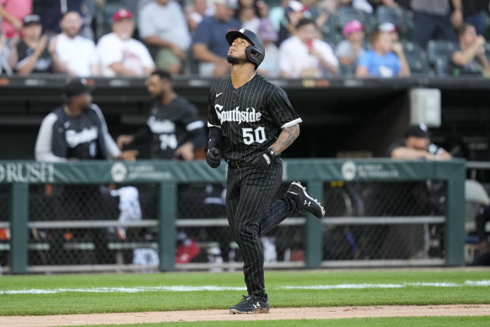 Chicago White Sox's Lenyn Sosa looks skyward as he heads home after his two-run home run off Oakland Athletics starting pitcher Zach Neal during the second inning of a baseball game Friday, Aug. 25, 2023, in Chicago. (AP Photo/Charles Rex Arbogast)