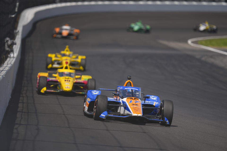 Kyle Larson drives into the second turn during the final practice for the Indianapolis 500 auto race at Indianapolis Motor Speedway in Indianapolis, Friday, May 24, 2024. (AP Photo/Michael Conroy)