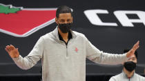 Houston Rockets head coach Stephen Silas calls a play during the first half of an NBA basketball game against the Toronto Raptors Friday, Feb. 26, 2021, in Tampa, Fla. (AP Photo/Chris O'Meara)