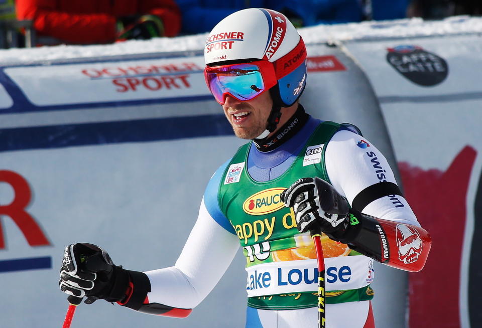 Mauro Caviezel, of Switzerland, reacts in the finish area at the men's World Cup super-G ski race at Lake Louise, Alberta, Sunday, Nov. 25, 2018. (Jeff McIntosh/The Canadian Press via AP)