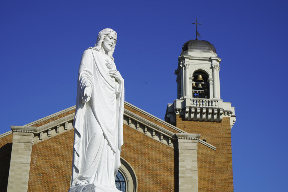 This Wednesday, Jan. 27, 2021, photo shows the Holy Name of Jesus Cathedral in Raleigh, N.C. The Raleigh Diocese collected at least $11 million from the federal government’s small business emergency relief program. Yet during the fiscal year that ended in June 2020, overall offerings were down just 5% and the assets available to the diocese, its parishes and schools increased by about $21 million to more than $170 million, AP found. In another measure of fiscal health, the diocese didn’t draw on a $10 million line of credit. (AP Photo/Allen G. Breed)