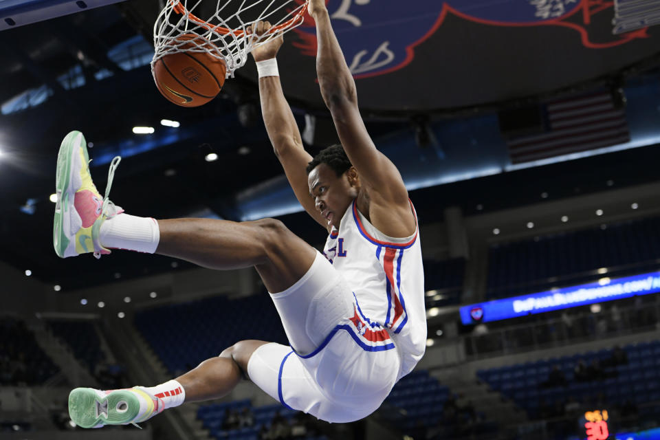 DePaul's Churchill Abass dunks against Marquette the second half of an NCAA college basketball game Wednesday, Jan. 24, 2024, in Chicago. (AP Photo/Paul Beaty)