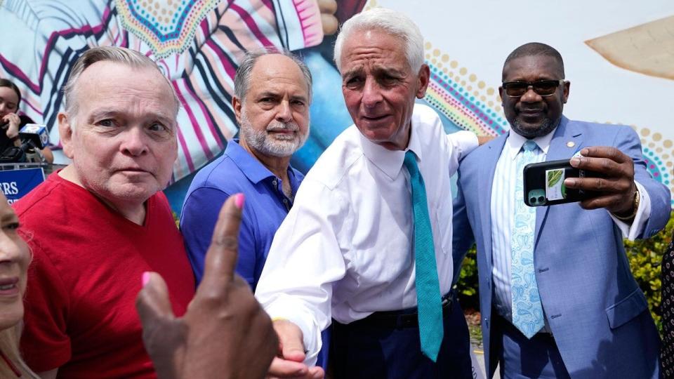 Charlie Crist meeting supporters in Miami-Dade County.