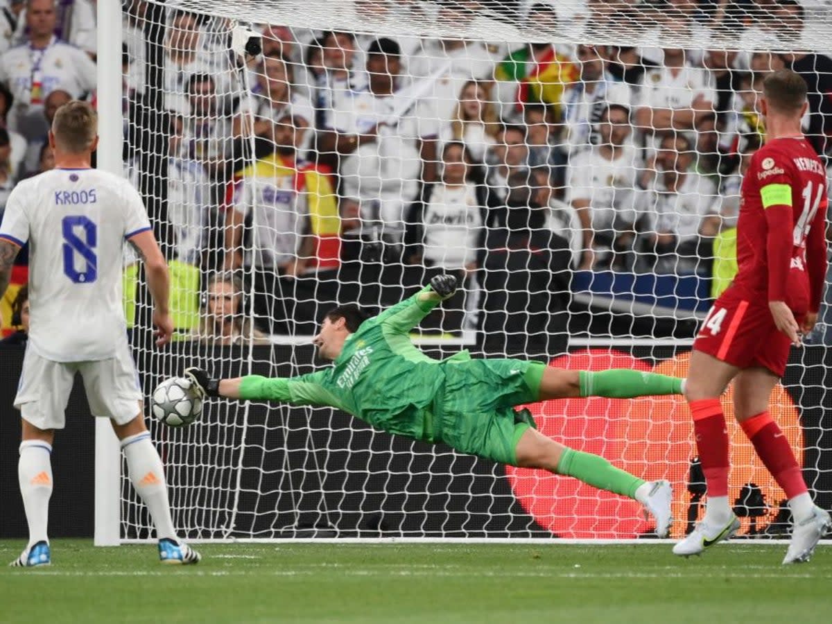 Courtois made a host of incredible saves as Madrid clung on to win the Champions League final (AFP via Getty Images)