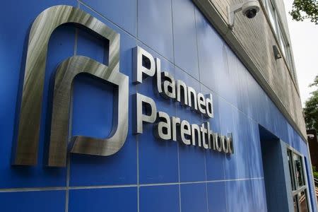 A sign is pictured at the entrance to a Planned Parenthood building in New York August 31, 2015. Picture taken August 31, 2015. REUTERS/Lucas Jackson