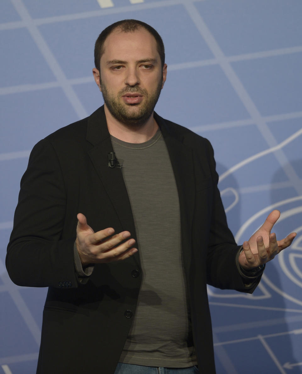 Co-founder and CEO of Whatsapp Jan Koum speaks during a conference at the Mobile World Congress, the world's largest mobile phone trade show in Barcelona, Spain, Monday, Feb. 24, 2014. Expected highlights include major product launches from Samsung and other phone makers, along with a keynote address by Facebook founder and chief executive Mark Zuckerberg. (AP Photo/Manu Fernandez)