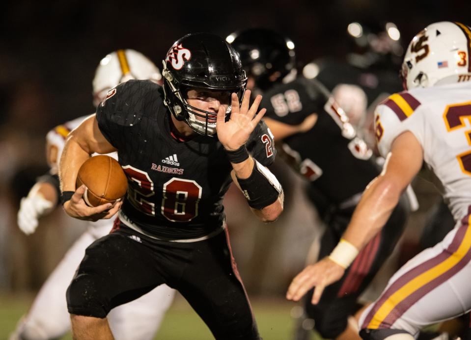 Southridge's Reid Schroeder (28) runs the ball as the Southridge Raiders play the Gibson Southern Titans at Southridge High School in Huntingburg, Ind., Friday evening, Sept. 16, 2022.