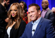 Host Arnold Schwarzenegger (R) and Tyra Banks participate in a panel for "The New Celebrity Apprentice" in Universal City, California, December 9, 2016. REUTERS/Danny Moloshok