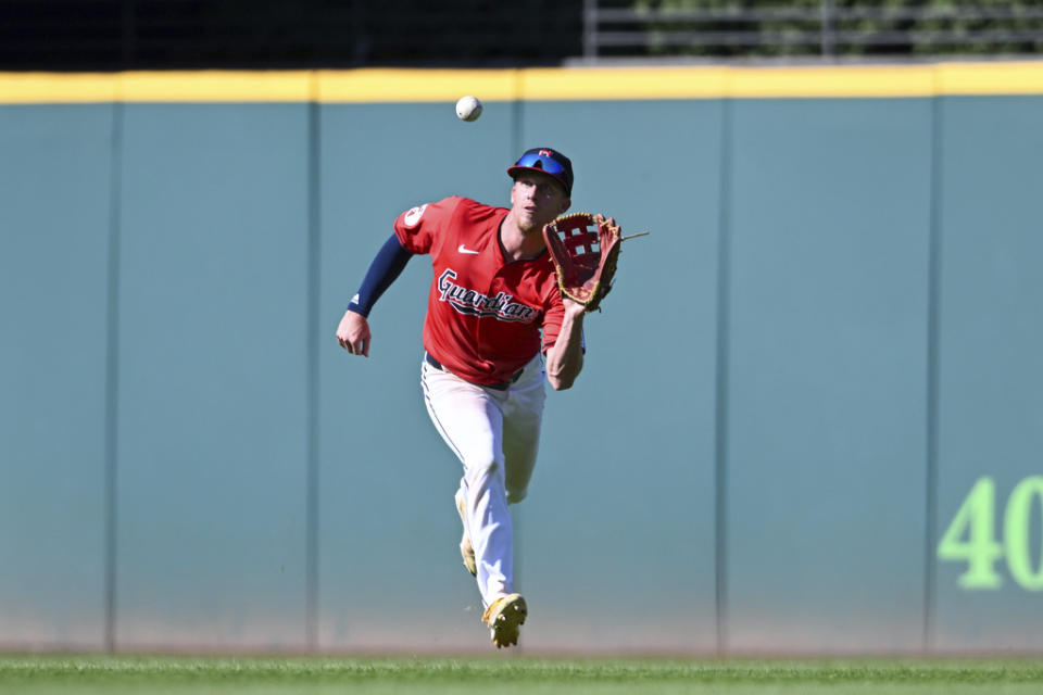 Cleveland Guardians’ Myles Straw catches a fly ball during the ninth inning of a baseball game against the Minnesota Twins, Thursday, Sept. 19, 2024, in Cleveland. (AP Photo/Nick Cammett)