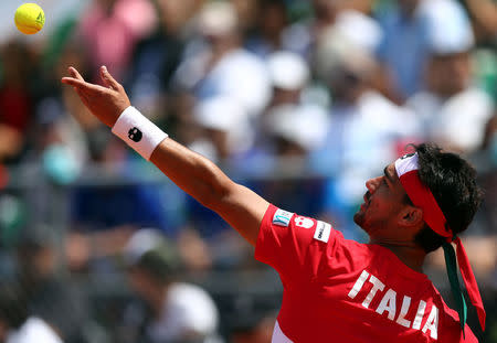 Tennis - Argentina v Italy - Davis Cup World Group First Round - Parque Sarmiento stadium, Buenos Aires, Argentina - 6/2/17. Italy's Fabio Fognini serves during his match against Argentina's Guido Pella. REUTERS/Marcos Brindicci