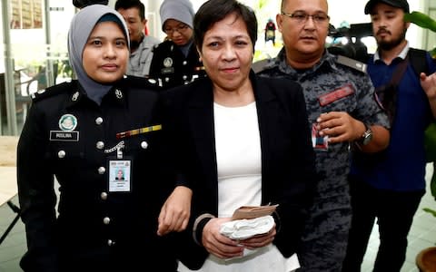 Australian Maria Elvira Pinto Exposto leaves following her release at the High Court in Shah Alam, outside Kuala Lumpur - Credit: Lai Seng Sin/ REUTERS