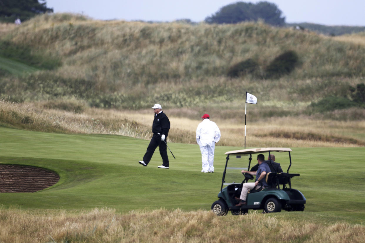 President Donald Trump walks off the 4th green while playing at Turnberry golf club in Turnberry, Scotland, on July 14, 2018. (Photo: Peter Morrison/ASSOCIATED PRESS)