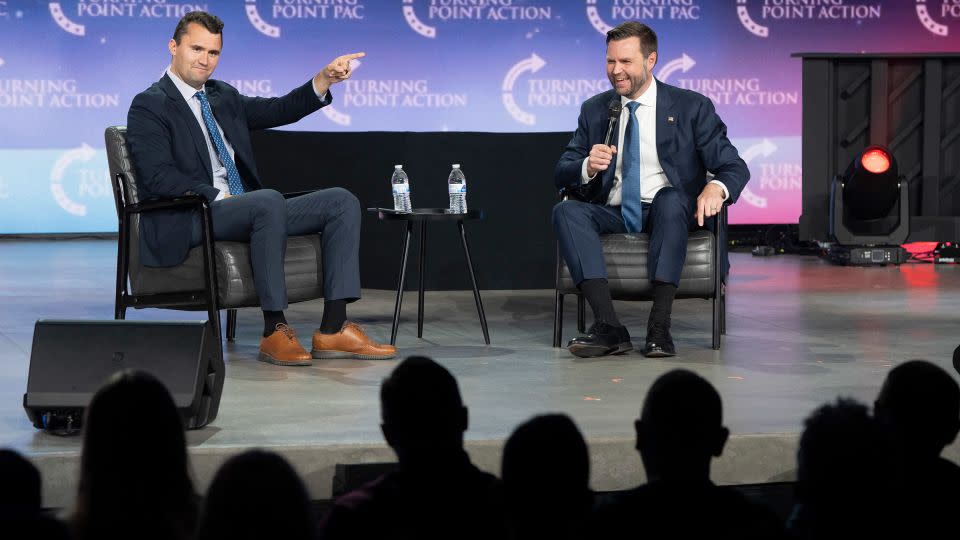 Turning Point executive director Charlie Kirk, left, moderates a conversation with Republican vice presidential candidate Sen. JD Vance during Turning Point Action's Chase the Vote campaign event at Generation Church in Mesa, Arizona, on September 4, 2024. - Rebecca Noble/AFP/Getty Images