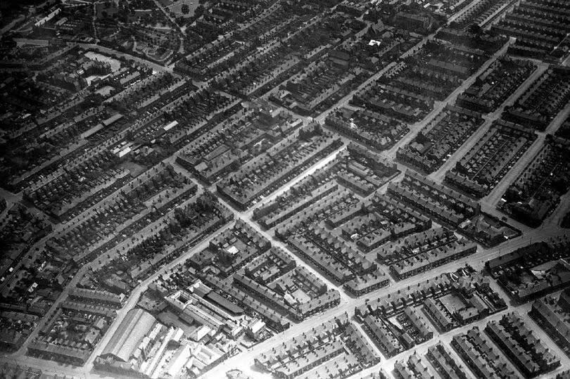 By the early 20th Century Greenheys was a warren of densely packed terraced housing, as this aerial photo from 1924 shows -Credit:Manchester Local Image Collection
