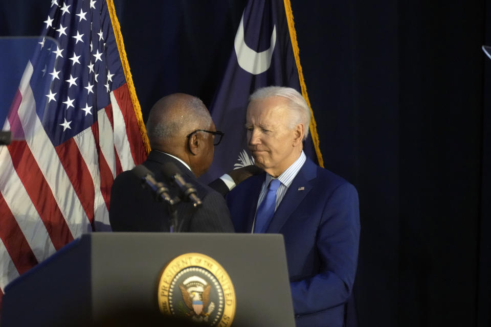 U.S. Rep. Jim Clyburn, D-S.C., introduces President Joe Biden, right, at the South Carolina Democratic Party's First-in-the-Nation Dinner, Saturday, Jan. 27, 2024, in Columbia, S.C. Speaking one week ahead of South Carolina's lead-off primary, Biden thanked Clyburn for his endorsement ahead of the state's 2020 vote, which turned around his campaign. (AP Photo/Meg Kinnard)