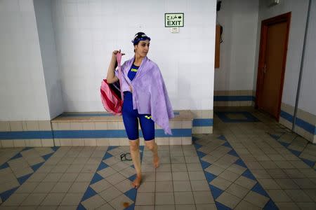 Palestinian swimmer Mary Al-Atrash, 22, who will represent Palestine at the 2016 Rio Olympics, leaves after training in a swimming pool in Beit Sahour, near the West Bank town of Bethlehem June 27, 2016. REUTERS/Ammar Awad