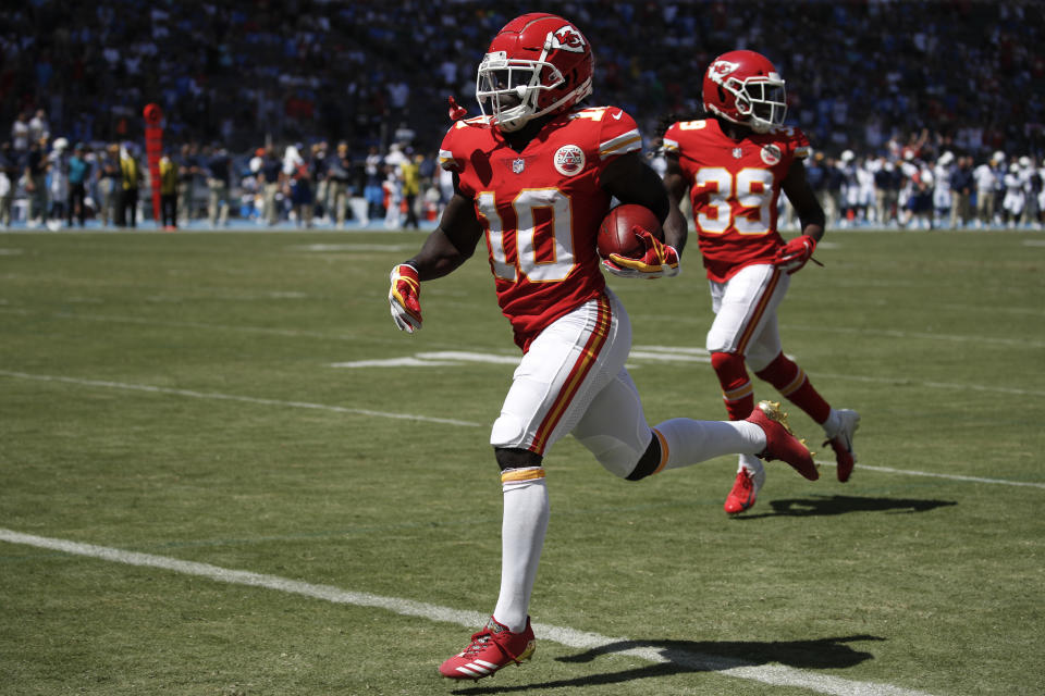 Kansas City Chiefs wide receiver Tyreek Hill (10) scores against the Los Angeles Chargers during the first half of an NFL football game Sunday, Sept. 9, 2018, in Carson, Calif. (AP Photo/Jae C. Hong)