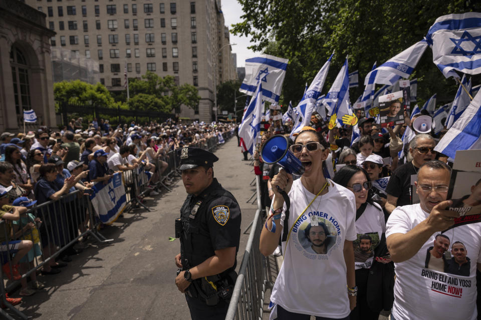 Participants march during the annual Israel Day Parade on Fifth Avenue on Sunday, June 2, 2024, in New York. (AP Photo/Yuki Iwamura)