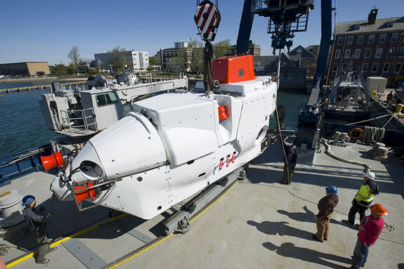 The upgraded submersible Alvin is loaded onto the R/V Atlantis on May 13, 2013.