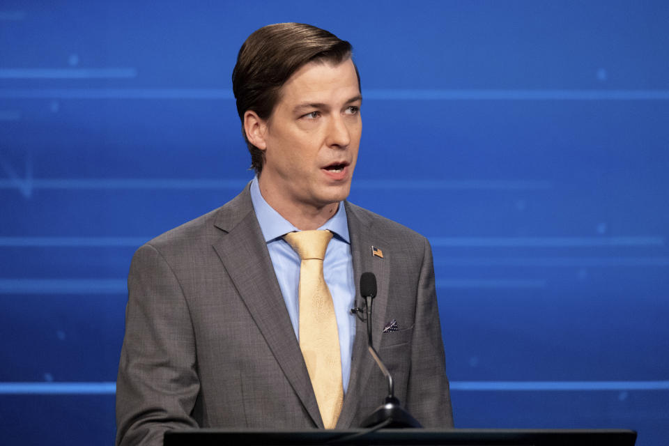 Libertarian challenger Chase Oliver speaks at a U.S. Senate debate with Sen. Raphael Warnock, D-Ga., during the Atlanta Press Club Loudermilk-Young Debate Series in Atlanta on Sunday, Oct. 16, 2022. Republican challenger Herschel Walker was invited but did not attend. (AP Photo/Ben Gray)