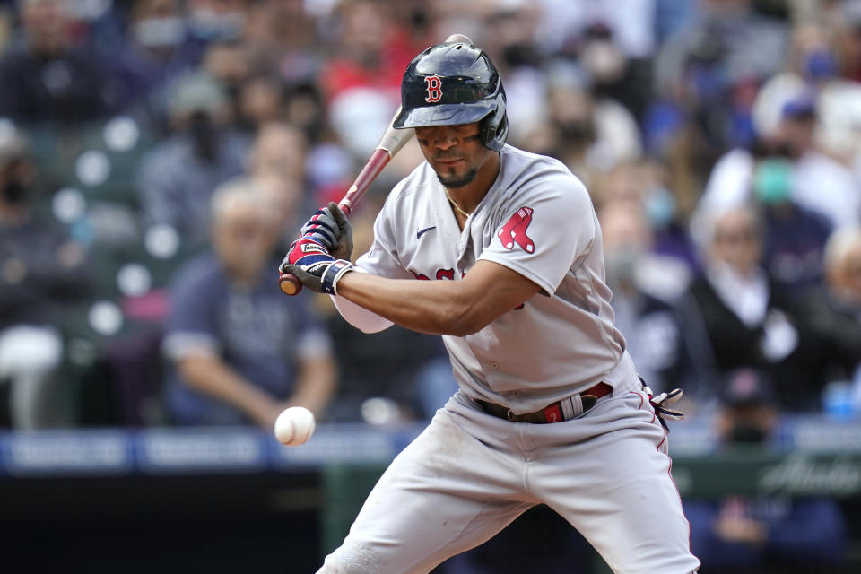 Boston Red Sox's Xander Bogaerts watches a called third strike go past during his at-bat against the Seattle Mariners in the sixth inning of a baseball game Wednesday, Sept. 15, 2021, in Seattle. (AP Photo/Elaine Thompson)