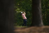 Scottie Scheffler hits on the 11th fairway during a practice round for the Masters golf tournament on Wednesday, April 7, 2021, in Augusta, Ga. (AP Photo/David J. Phillip)